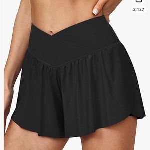 black cross over shorts
